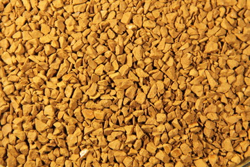 Abstract background of the instant coffee granules 