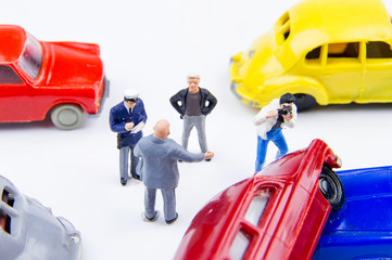 Miniature tiny toys car crash accident damaged.Accident on the r