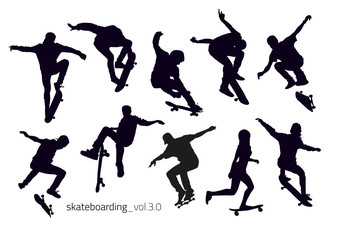 Set of black silhouettes of skateboarders doing jumping © shurkin_son