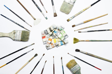 tubes of paint and brushes