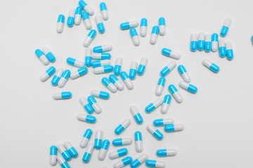 Blue Pills on a white background, medical pills