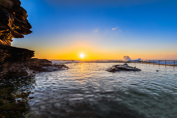Sunrise on the Rock pool at North Curl Curl Beach, Sydney, Australia