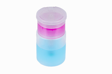 Small plastic vial bottle filled with the blue liquid isolated over the white background