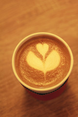 Latte in a takeaway cup