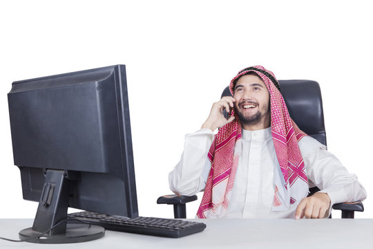 Arabian man speaking on cellphone