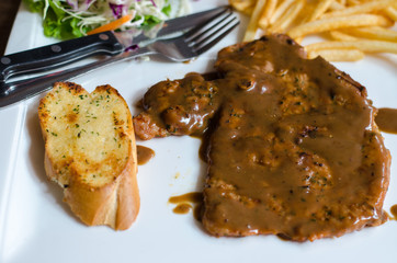 Grilled beef steak on plate