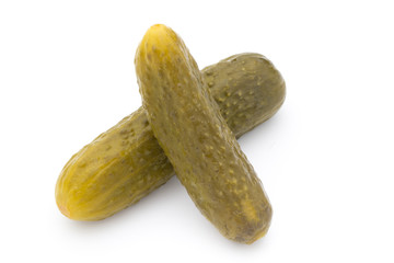 Marinated pickled cucumbers isolated on the white.