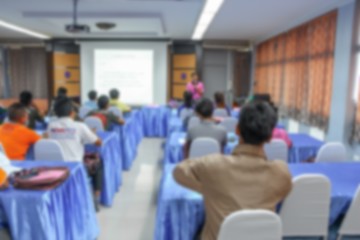 Fototapeta premium blurred focus, student learning business sitting in classroom with teacher front 