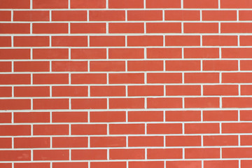 Wall from a brick with cement traces.