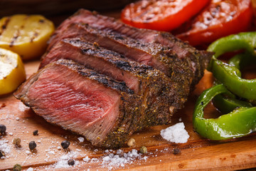 Juicy steak and grilled vegetables with spices