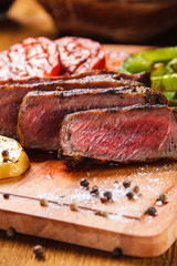 Juicy steak and grilled vegetables with spices