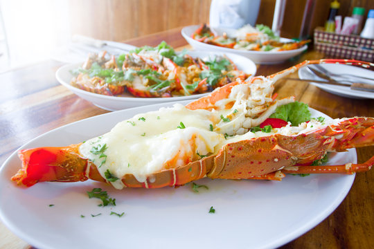 Bake Thai Spiny Lobster With Cheese On Dinner Table