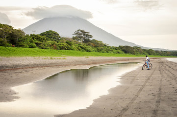 Volcanic landscape of the Ometepe Island, Nicaragua. Very active Concepcion volcano is fuming on...