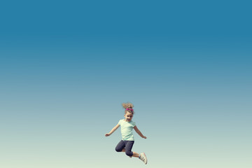 Jumping little girl