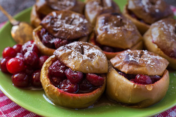 Close up of baked apples with cranberries