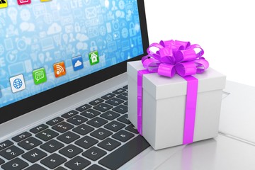 Gift box with ribbon on laptop keyboard. 3d rendering.