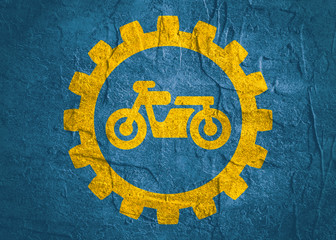 Motorcycle icon in gear. Minimalistic sign on concrete textured background. Trendy Flat style for graphic design