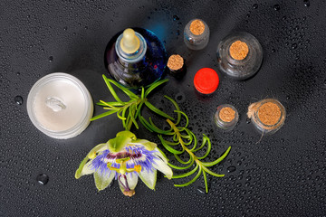 Obraz na płótnie Canvas top view of spa composition blue passiflora flower, cosmetic sal