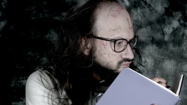 4k Crazy Professor Science Man Writing down Formulas