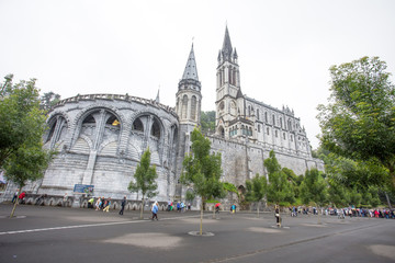 Fototapeta na wymiar LOURDES, FRANCE - JUNE 10, 2016: Notre Dame du Rosaire de Lourdes (Basilica of our Lady of the Rosary) the roman Catholic church in Lourdes, France, in June 10, 2016