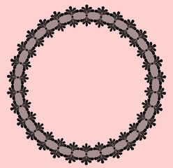 Round black lacy frame on pink background.