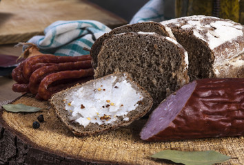 Pickles. Salted Cucumbers still-life with dark bread