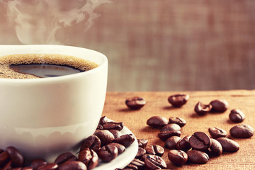Coffee cup and coffee beans