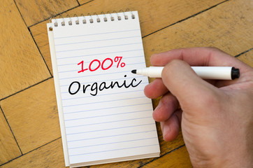 100% organic concept on notebook