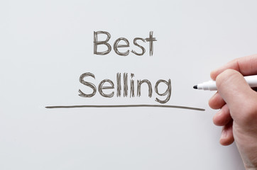 Fototapeta premium Best selling written on whiteboard