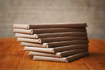 A lot of chocolates in the package on the table