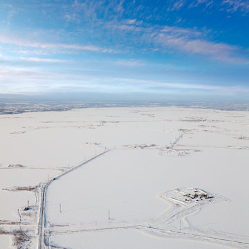 Oilfield on the Samotlor lake in winter, top view