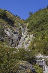 Fototapeta na wymiar Small waterfall from Karkonosze, Poland.