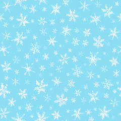 Pattern of watercolor snowflakes isolated on blue.