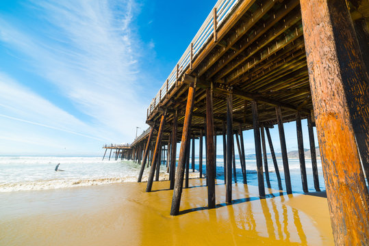 Surfer By Pismo Beach Pier