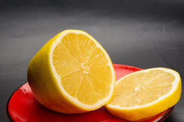 red saucer of lemon slices