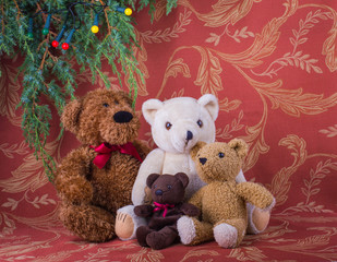 Christmas composition with family of four teddy bears
