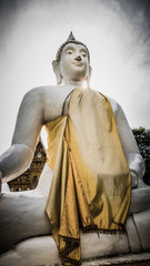 Retro photo . Buddha white statue  in Wat Prang Luang buddhist temple( Public temple ) in Nonthaburi, Thailand / Selective focus on face buddha. Take photo : September 10, 2016