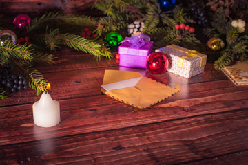 New Year greeting card on wooden table with decorations and christmas