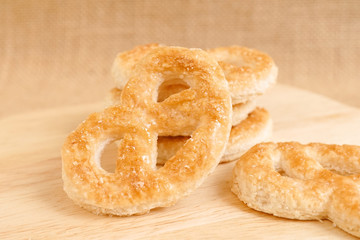 Pastry pretzel, Pretzel shaped sugar cookies made of puff pastry with butter.