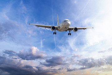 Passenger plane take off from runways against beautiful cloudy s
