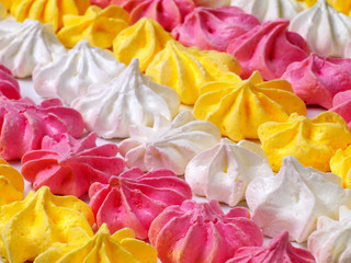 small colorful meringues closeup, shallow depth of field, selective focus