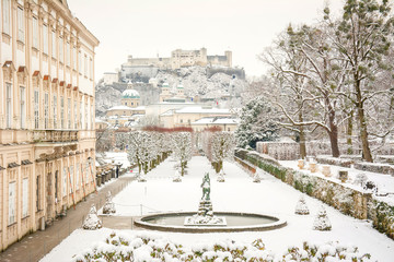 views to hohensalzburg fortress from mirabell gardens at winter landscape