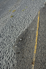 Fototapeta premium Broken road with sand background