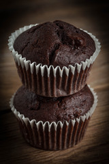 Chocolate muffin on dark background.