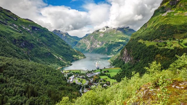 Timelapse, Geiranger fjord, Norway - 4K ULTRA HD, 4096x2304. It is a 15-kilometre (9.3 mi) long branch off of the Sunnylvsfjorden, which is a branch off of the Storfjorden (Great Fjord).