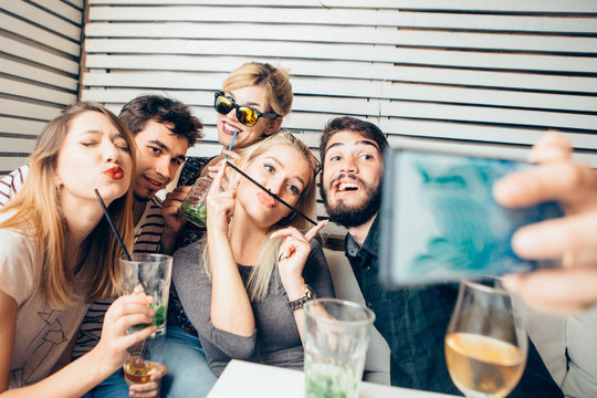 Group Of Friends Making Selfie At Cafe 