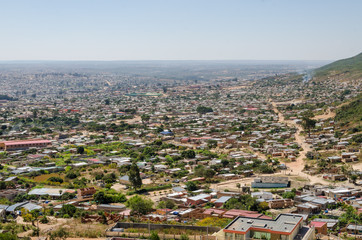 Aerial or rock view of African town Lubango with colorful houses in Angola
