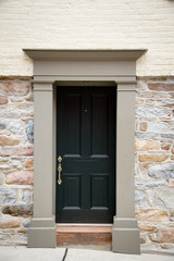 Fototapeta na wymiar Old wooden door in Colonial architecture