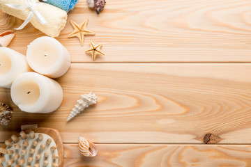 candles and seashells for the mood and relaxation on the boards