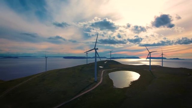 Windmills for electric power production. Arctic View Havoygavelen windmill park, Havoysund, Northern Norway Aerial footage.